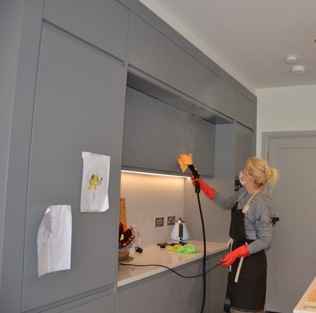 Ecoleen steam cleaning kitchen units during a deep clean in Dublin