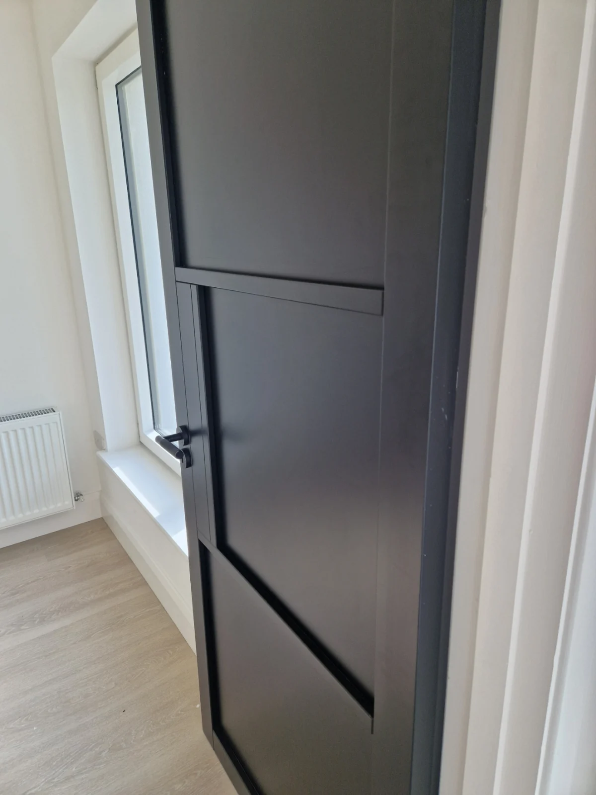 The same door after an after builders clean