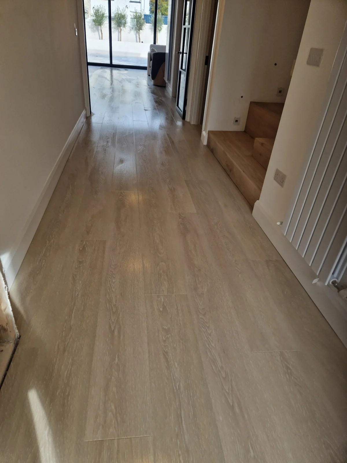 The same hall floor after an after builders clean